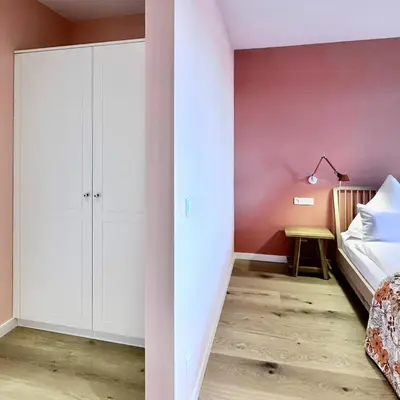 Ein Bett oder Betten in einem Zimmer der Unterkunft Schöne Aussicht Rosenhagen Haus 4