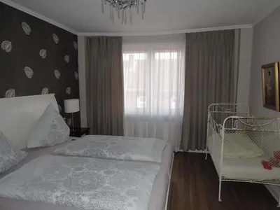 Ein Bett oder Betten in einem Zimmer der Unterkunft Ferienwohnung Ein Zuhause auf Zeit