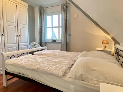 Ein Bett oder Betten in einem Zimmer der Unterkunft Ferienhaus 