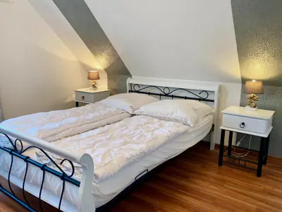 Ein Bett oder Betten in einem Zimmer der Unterkunft Ferienhaus 