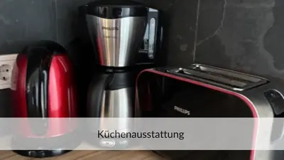 Kaffee-/Teezubehör in der Unterkunft Strandvilla Haffkrug Apartment Strandläufer