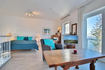 TV/Unterhaltungsangebot in der Unterkunft Haus Miramar TREF Appartement 59