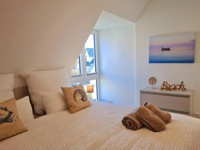 Ein Bett oder Betten in einem Zimmer der Unterkunft Villa Kleine Auszeit