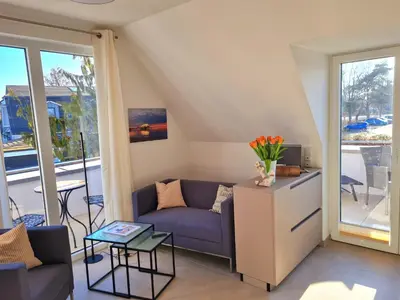 Ein Sitzbereich in der Unterkunft Villa Kleine Auszeit