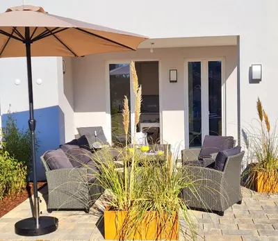 Ein Sitzbereich in der Unterkunft Villa Kleine Auszeit