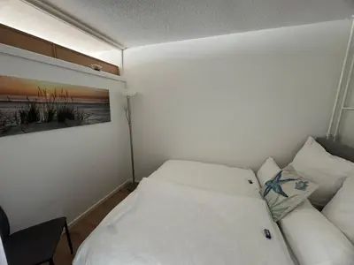 Ein Bett oder Betten in einem Zimmer der Unterkunft Ostsee Apartment mit Meerblick