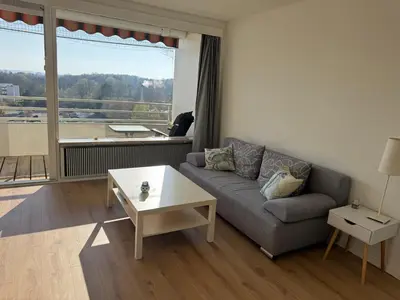 Ein Sitzbereich in der Unterkunft Ostsee Apartment mit Meerblick