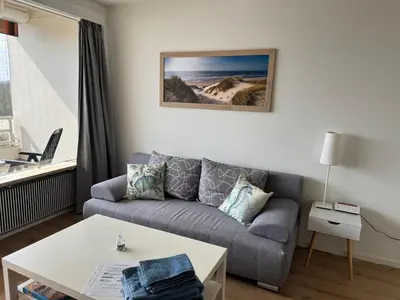 Ein Sitzbereich in der Unterkunft Ostsee Apartment mit Meerblick