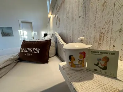 Ein Bett oder Betten in einem Zimmer der Unterkunft Villa Pension Strandhaus - adults only