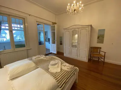 Ein Bett oder Betten in einem Zimmer der Unterkunft Villa Pension Strandhaus - adults only