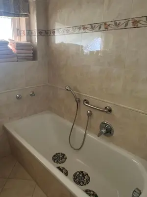 Ein Badezimmer in der Unterkunft Dünenhaus Garten