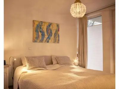 Ein Bett oder Betten in einem Zimmer der Unterkunft House on the Beach Comfortable holiday residence