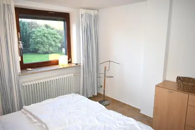 Ein Bett oder Betten in einem Zimmer der Unterkunft Haus OstseeBrise