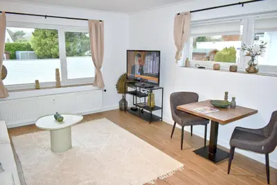 Ein Sitzbereich in der Unterkunft Küstenzauber Appartement