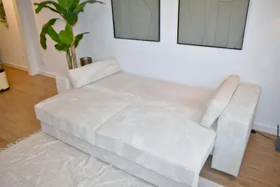 Ein Bett oder Betten in einem Zimmer der Unterkunft Küstenzauber Appartement