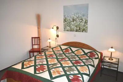 Ein Bett oder Betten in einem Zimmer der Unterkunft Ostseeallee 12 Ferienwohnung Nr 08