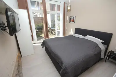 Ein Bett oder Betten in einem Zimmer der Unterkunft Kalkberg Ferienwohnungen