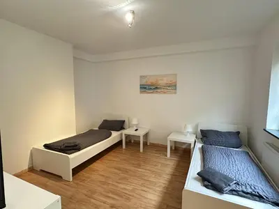 Ein Bett oder Betten in einem Zimmer der Unterkunft Unterkunft bei Lübeck - Zentral an der A1 - Parkplatz - Terrasse