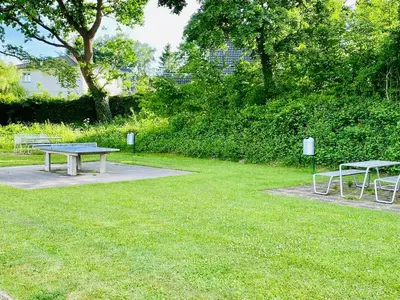 Ein Garten an der Unterkunft FeWo PANORAMADECK Familien-strandnah-Garten-Hunde-Sport-und Schwimmbadnah-HansaPark