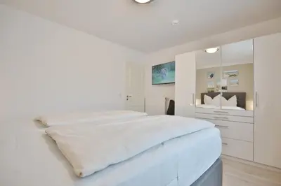 Ein Bett oder Betten in einem Zimmer der Unterkunft Hanseaten Residenz Hanseaten-Residenz Appartement 3