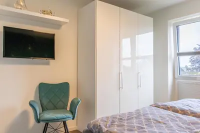 Ein Bett oder Betten in einem Zimmer der Unterkunft Neue Liebe Haffkrug 4