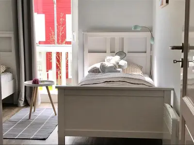 Ein Bett oder Betten in einem Zimmer der Unterkunft Wolke 7 - Meerblick, Kaminofen, Sauna