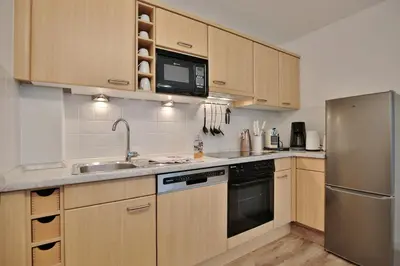 Küche/Küchenzeile in der Unterkunft Haus Seerose Seerose II Appartement 11