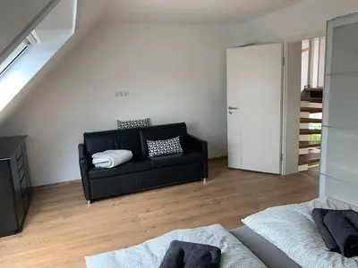 Ein Bett oder Betten in einem Zimmer der Unterkunft MeerZeit-Scharbeutz