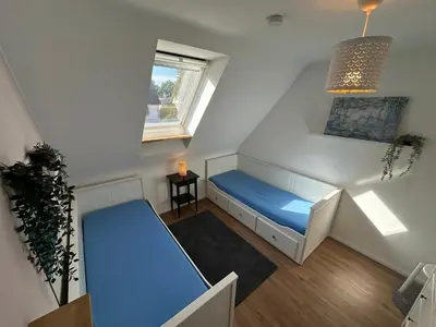 Ein Bett oder Betten in einem Zimmer der Unterkunft Haus Königsee 