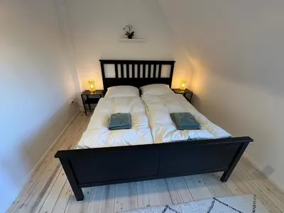 Ein Bett oder Betten in einem Zimmer der Unterkunft Haus Königsee 