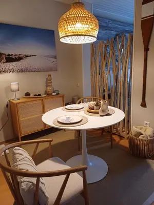 Ein Sitzbereich in der Unterkunft Appartement Strandallee Brise