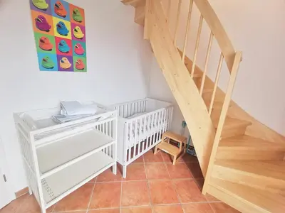 Ein Bett oder Betten in einem Zimmer der Unterkunft Obj 87 Familiy Ferienhaus für 2-6 Personen 100 m zum Strand, Garten