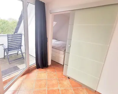 Ein Bett oder Betten in einem Zimmer der Unterkunft Obj 87 Familiy Ferienhaus für 2-6 Personen 100 m zum Strand, Garten