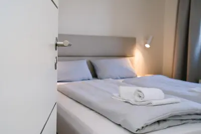 Ein Bett oder Betten in einem Zimmer der Unterkunft Ferienwohnung 