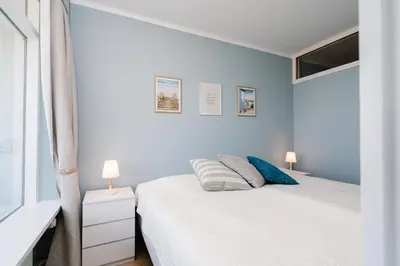 Ein Bett oder Betten in einem Zimmer der Unterkunft Panoramic Sierksdorf App A12-1