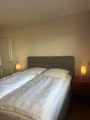 Ein Bett oder Betten in einem Zimmer der Unterkunft Dünenhaus Garten 2 Schlafzimmer