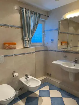 Ein Badezimmer in der Unterkunft Dünenhaus Garten 2 Schlafzimmer