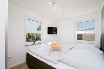 Ein Bett oder Betten in einem Zimmer der Unterkunft Ferienwohnung 