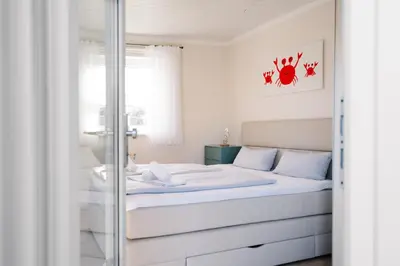 Ein Bett oder Betten in einem Zimmer der Unterkunft Ferienwohnung 