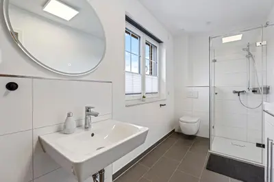 Ein Badezimmer in der Unterkunft Ferienwohnung Strandhafer Rosenhagen bei Travemünde