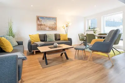 Ein Sitzbereich in der Unterkunft Lüttge Hus