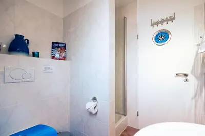 Ein Badezimmer in der Unterkunft Ferienwohnung 