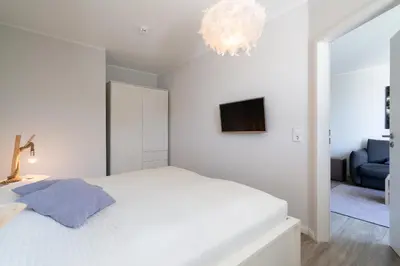 Ein Bett oder Betten in einem Zimmer der Unterkunft Ferienwohnung 