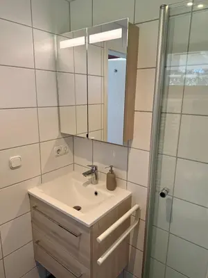 Ein Badezimmer in der Unterkunft FeWo am See