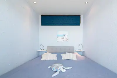 Ein Bett oder Betten in einem Zimmer der Unterkunft Panoramic Sierksdorf Ostsee Fernblick 12