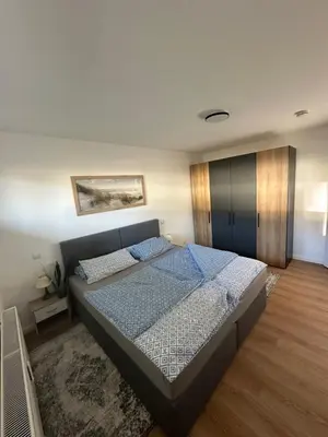 Ein Bett oder Betten in einem Zimmer der Unterkunft FEWO Relax 1
