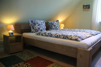 Ein Bett oder Betten in einem Zimmer der Unterkunft Ferienhaus 