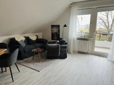 Ein Sitzbereich in der Unterkunft Baltic Nr 18