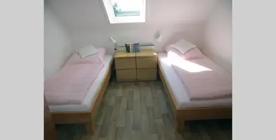 Ein Bett oder Betten in einem Zimmer der Unterkunft Apartment Peters