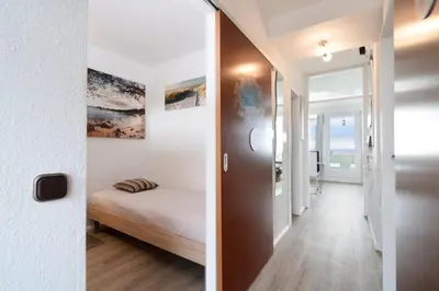 Ein Bett oder Betten in einem Zimmer der Unterkunft Ferienpark Sierksdorf App 211